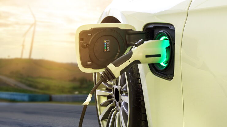 Electric car or EV car charging in station. Eco-friendly alternative energy concept. Electric car or EV car charging in station. Eco-friendly alternative energy concept.